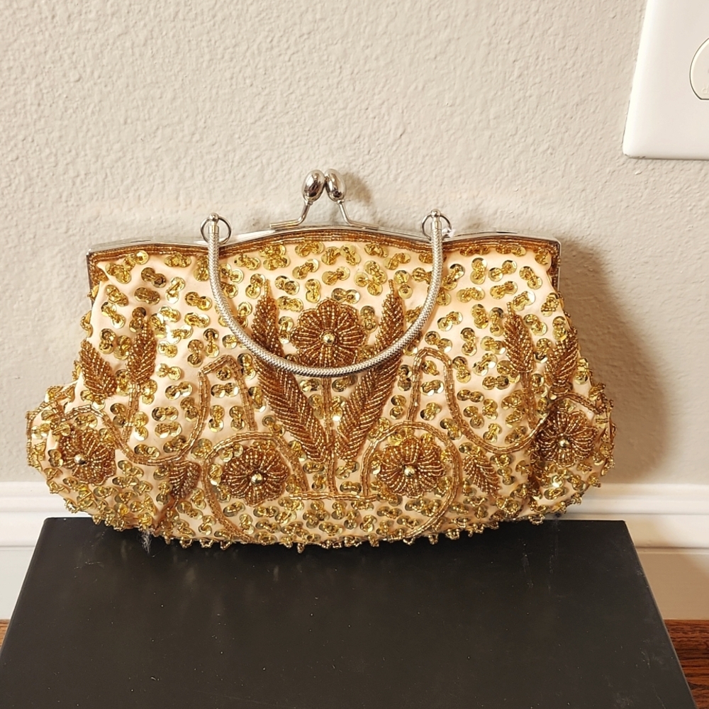 Gold evening purse never used with tags